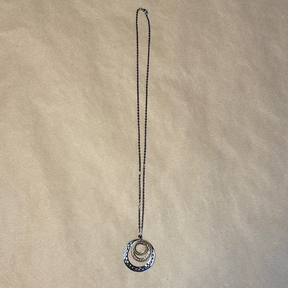 Elegant Hammered Silver and Gold Pendant Necklace